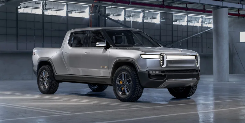Rivian Stock Price Rollercoaster: Tesla, Layoffs, and What the Hell is Going On